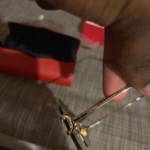 Cartier Gold and Black Glasses